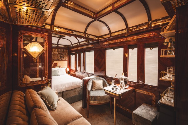 A grand suite in the Venice Simplon-Orient-Express comes complete with its own cabin steward,in-suite dining, and free-owing Champagne.<br><br>Photo Credit: Belmond.